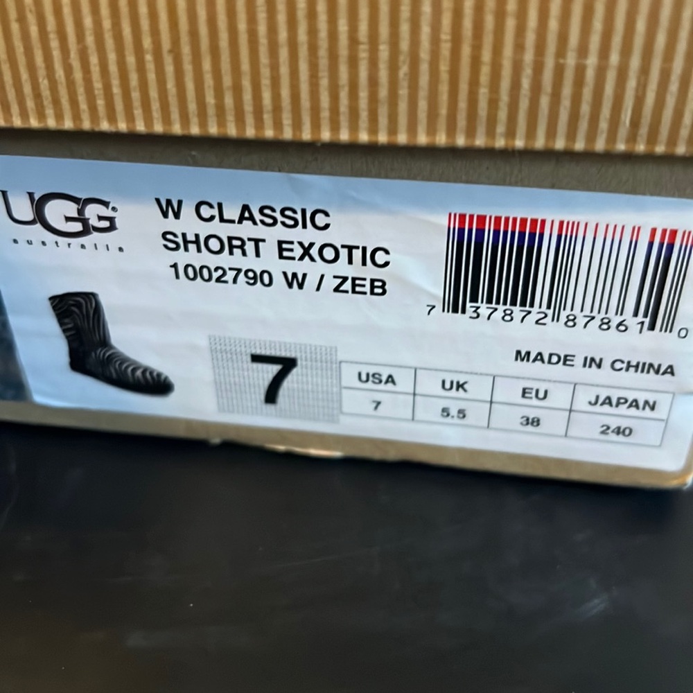 Ugg women size 7 short exotic zebra print boot